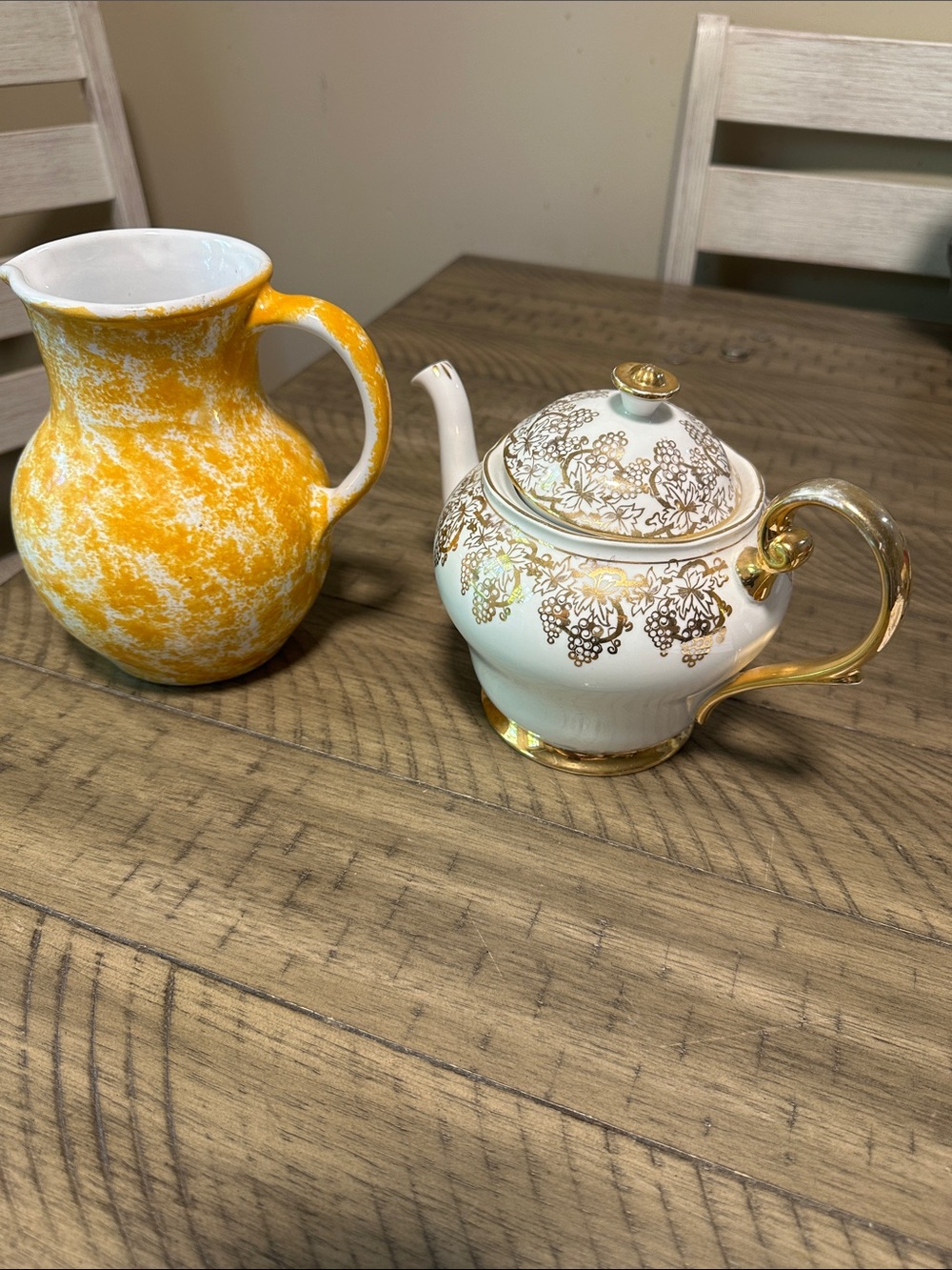 Gold-Accented White Ceramic Teapot by